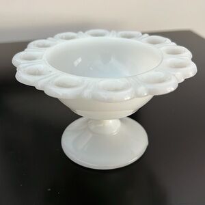 White milk glass footed dish. 3” tall. 5” diameter. Perfect condition.